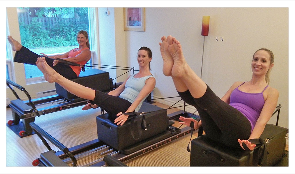 Pilates class on reformer